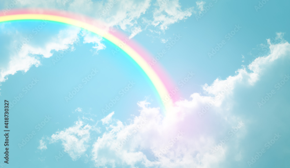 cloud with rainbow on pastel sky