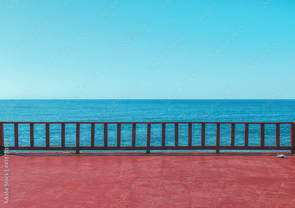 Beautiful background from the sea pier with a view of the blue sky and the sea horizon. Calm seascape. Beautiful background from the sea pier with a view of the blue sky and the sea horizon. Calm seascape.