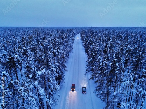Drone view for the forest winter road in Estonia
