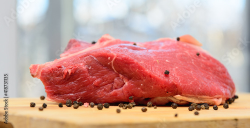 Cuadro en lienzo A piece of fresh beef lies on the cutting board