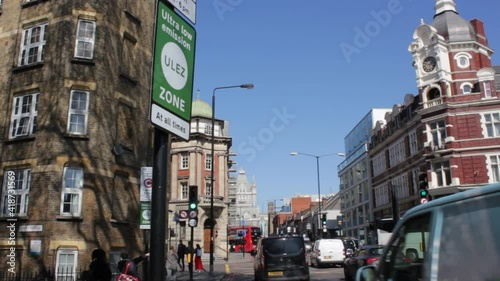 ULEZ stock footage London, UK - April 9 2019: ULEZ (Ultra low emission zone) London prepare Ultra Low Emission Zone (ULEZ) warning sign central London. 15 minute city town planning photo