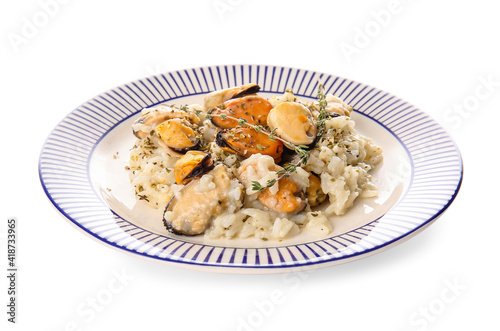 Plate with tasty risotto on white background