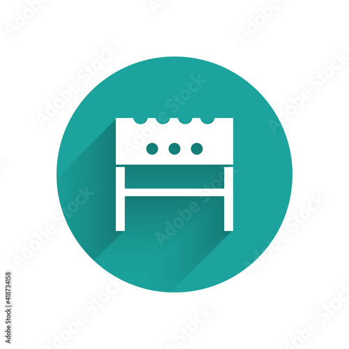 Paper cut BBQ brazier icon isolated on blue background. Paper art style. Vector.