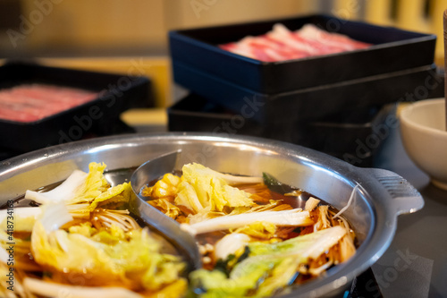 Shabu-shabu, thin slices of beef and many vegetable in hot soup