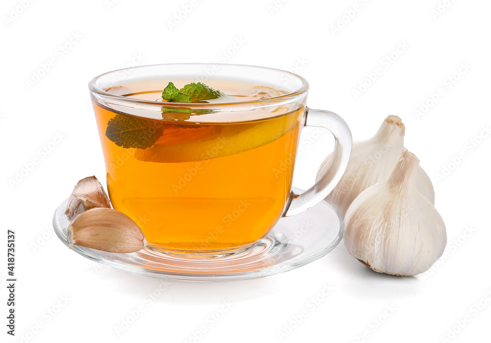 Cup of healthy garlic tea on white background Cup of healthy garlic tea on white background