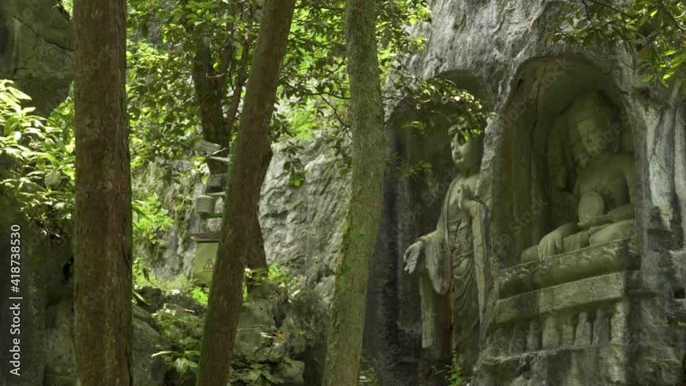 Ancient carving rock gods at Lingyin temple Hangzhou China Ancient carving rock gods at Lingyin temple Hangzhou China