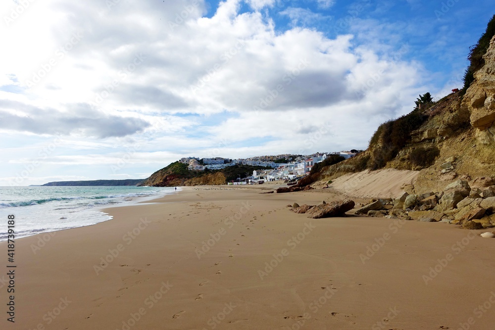 Winters day with an empty beach at Salema on the Algarve, Portugal Winters day with an empty beach at Salema on the Algarve, Portugal