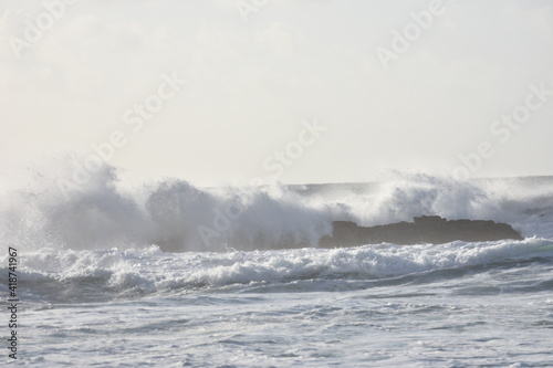 Watching the waves from the cliff