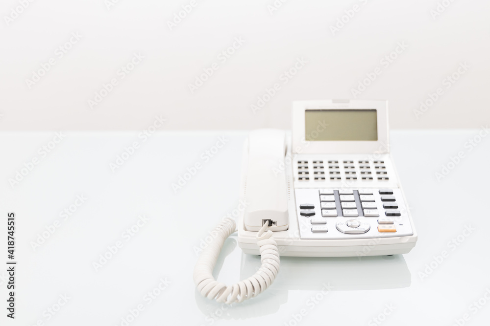 Landline on the desk white background Landline on the desk white background