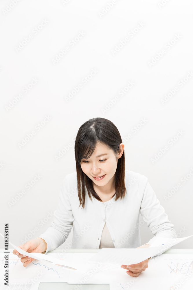 Woman viewing materials at a meeting Woman viewing materials at a meeting