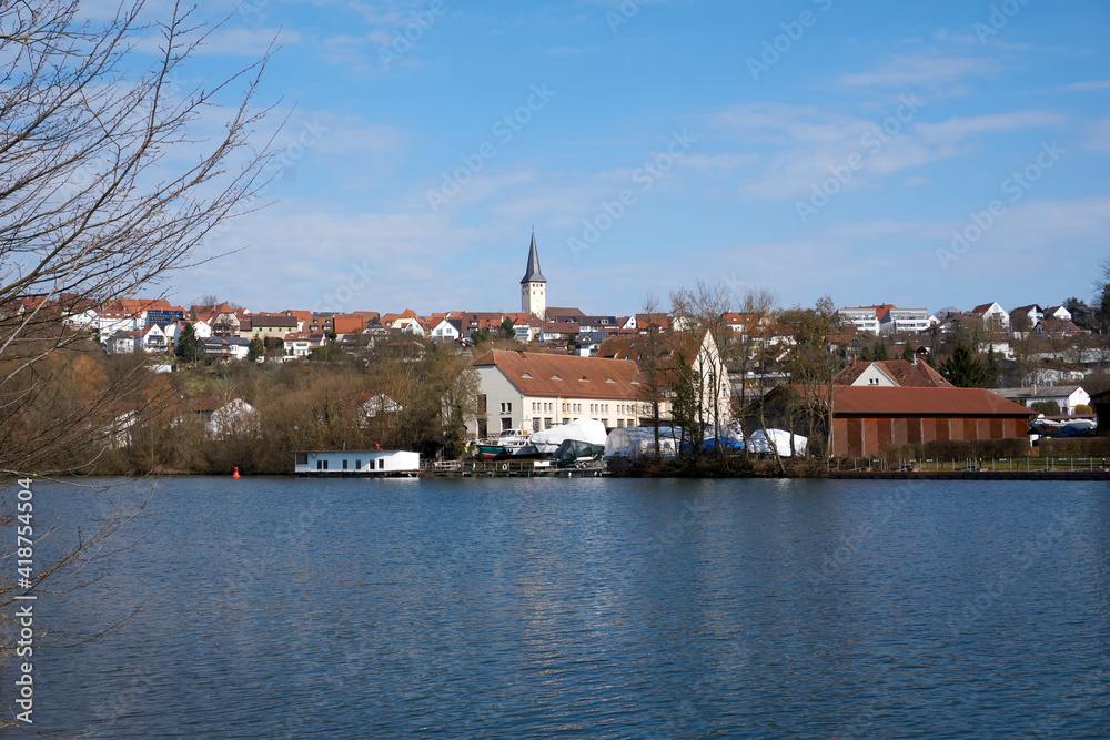 neckar river with city and church in the background