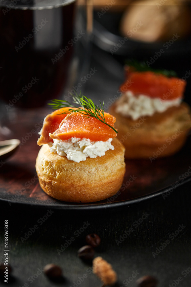 Yorkshire pudding with cream cheese and salmon, a traditional English dish Yorkshire pudding with cream cheese and salmon, a traditional English dish