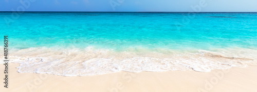 Panorama of wave of the sea on the sand beach in Punta Cana, Dominican Republic.