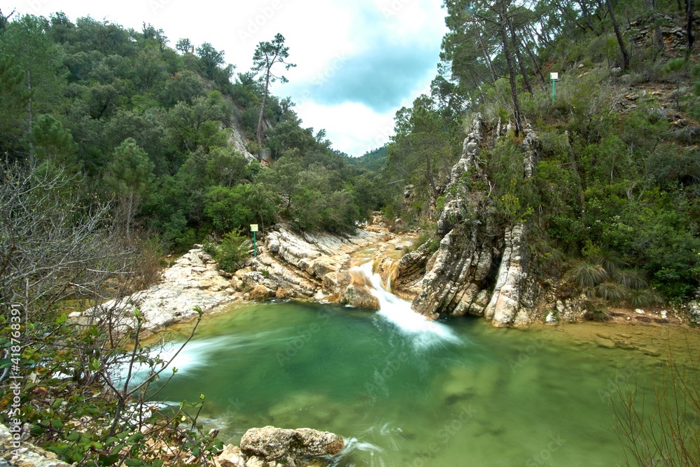 Views of the source of the river Borosa in the Natural Park of the Sierras de Cazorla, Segura y las Villas, Andalusia, Spain. Route on a rainy day