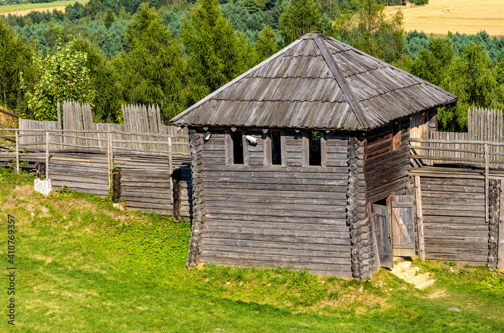 Wooden defense walls and tower of Gora Birow Mountain stronghold near Ogrodzieniec Castle, at Cracow-Czestochowa upland in Podzamcze od Silesia in Poland