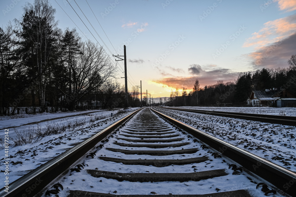 Fototapeta premium Winter sunset in the railway.