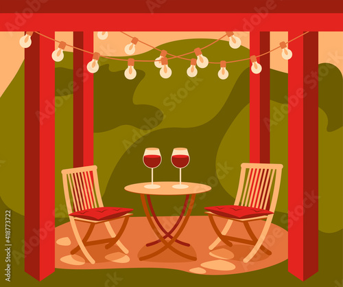Two chairs and table in garden