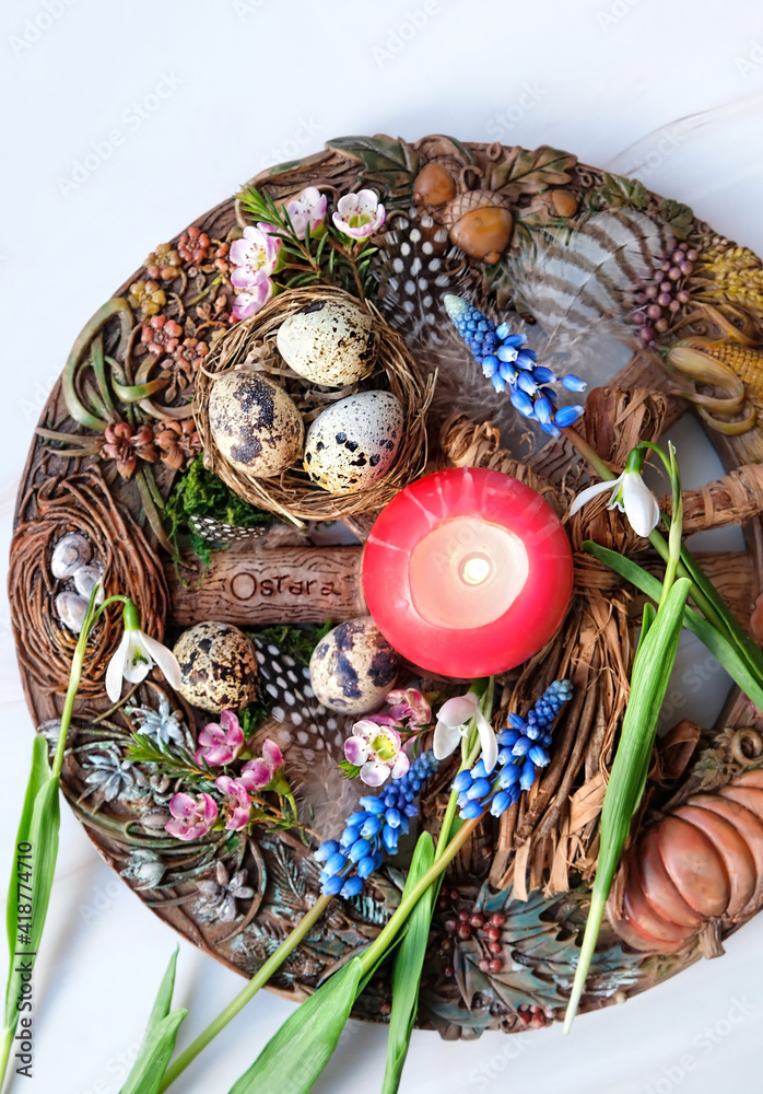 Wiccan Altar for spring Ostara sabbath. wheel of the year with candle