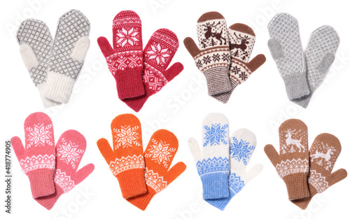 Set of multicolored knitted mittens. Warm woolen knitted mittens photo