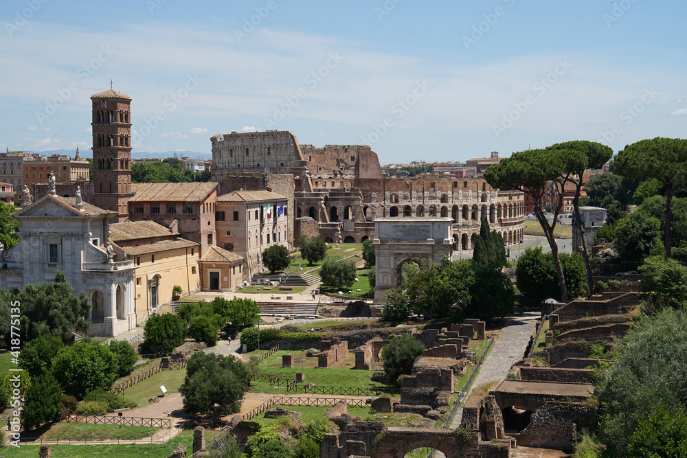 Ancient Roman Forum and Colosseum aerial panoramic view, heart of Roman Empire, famous tourist forum romanum landmark, Rome, Italy