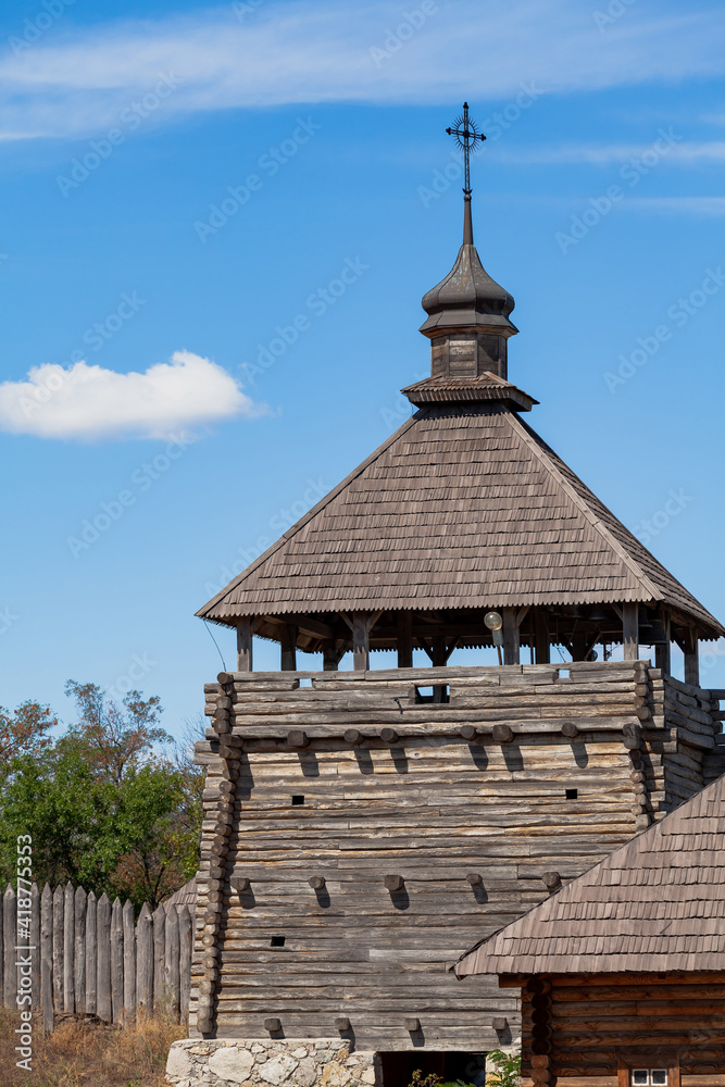 Wooden watchtower and palisade