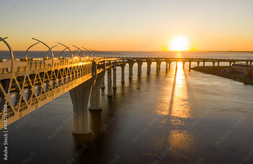 High-speed toll road, highway bypassing the city center St. Petersburg, the central section of the western high-speed section. A beautiful view of the sunset over the Gulf of Finland