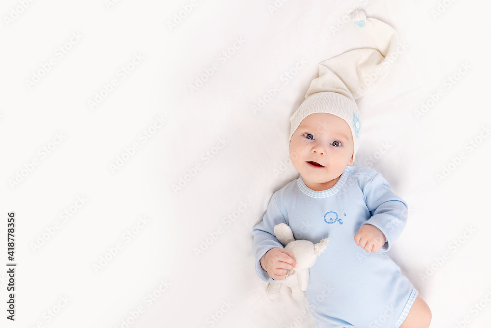baby in the crib at home in the morning or before going to bed, portrait, family and birth concept baby in the crib at home in the morning or before going to bed, portrait, family and birth concept