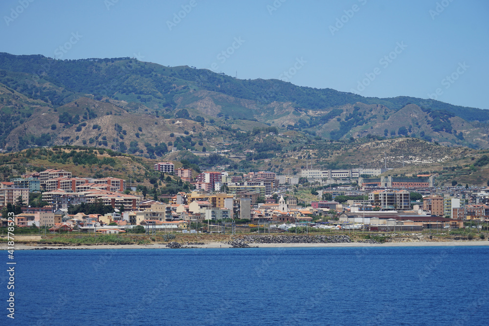 Messina harbour town aerial panoramic view from sea, Sicily, Italy