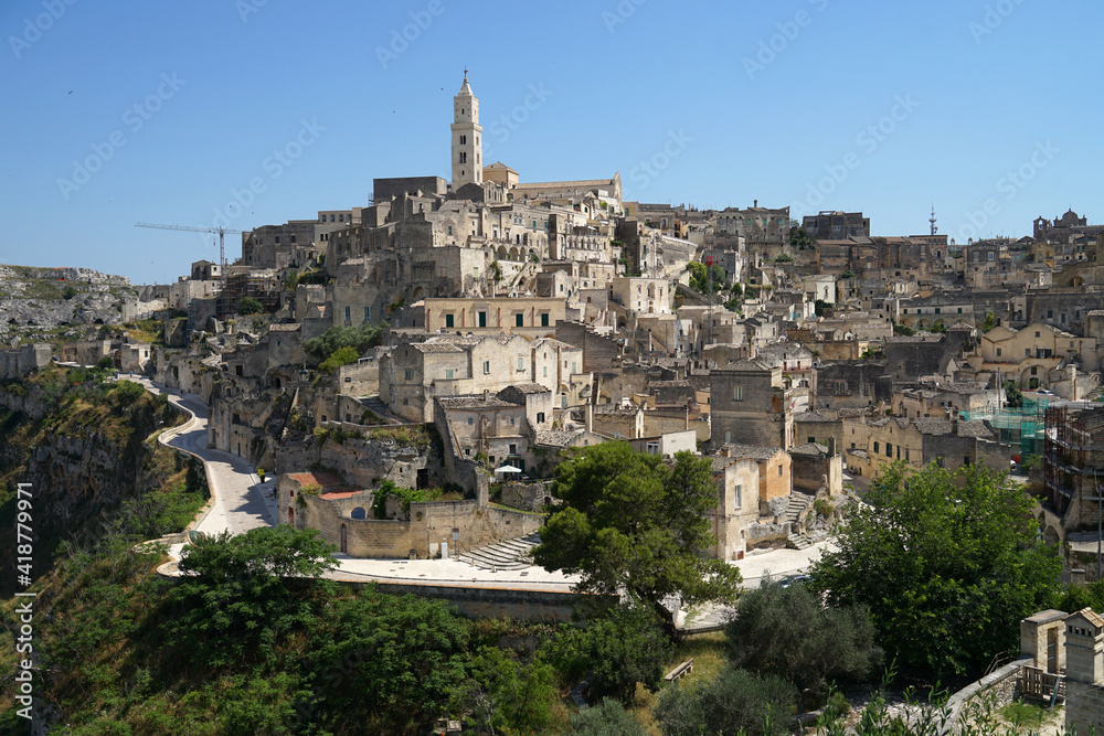 Sassi di Matera ancient hill with cathedral aerial panoramic cityscape, popular tourist travel place, guided tour concept, Basilicata, Italy