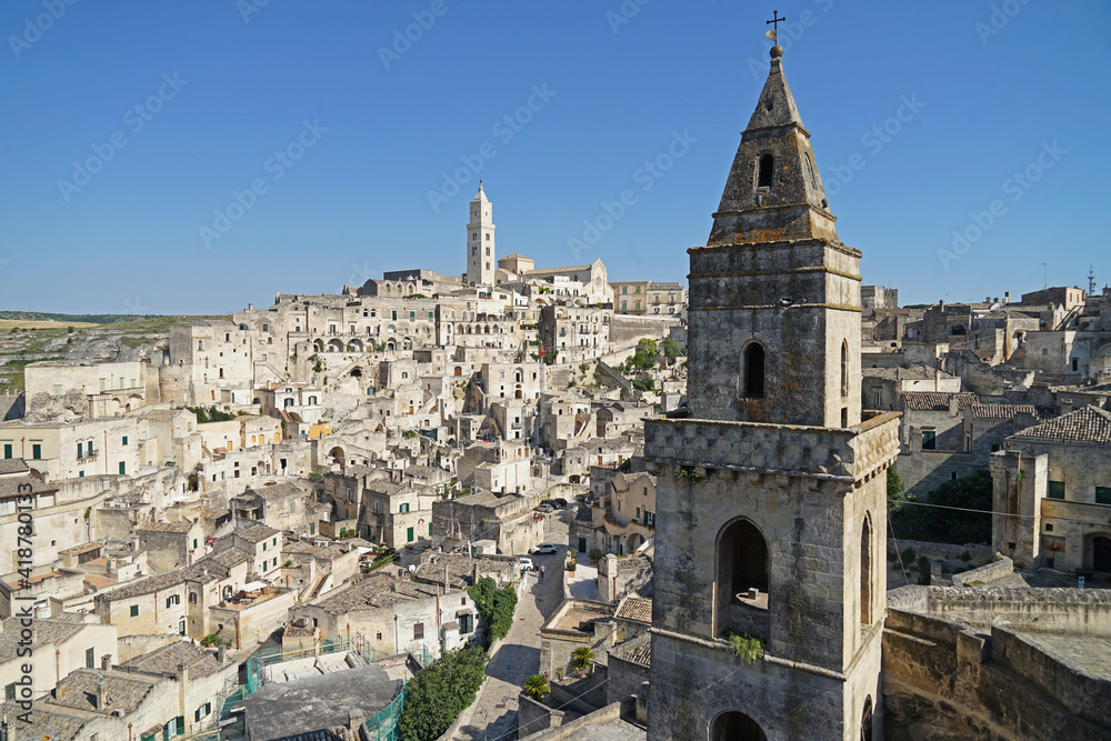 Sassi di Matera historic site aerial panoramic cityscape with church bell tower, popular tourist travel place, guided tour concept, Basilicata, Italy
