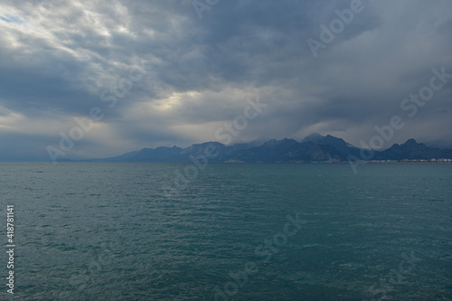 sea and mountains with foggy weather