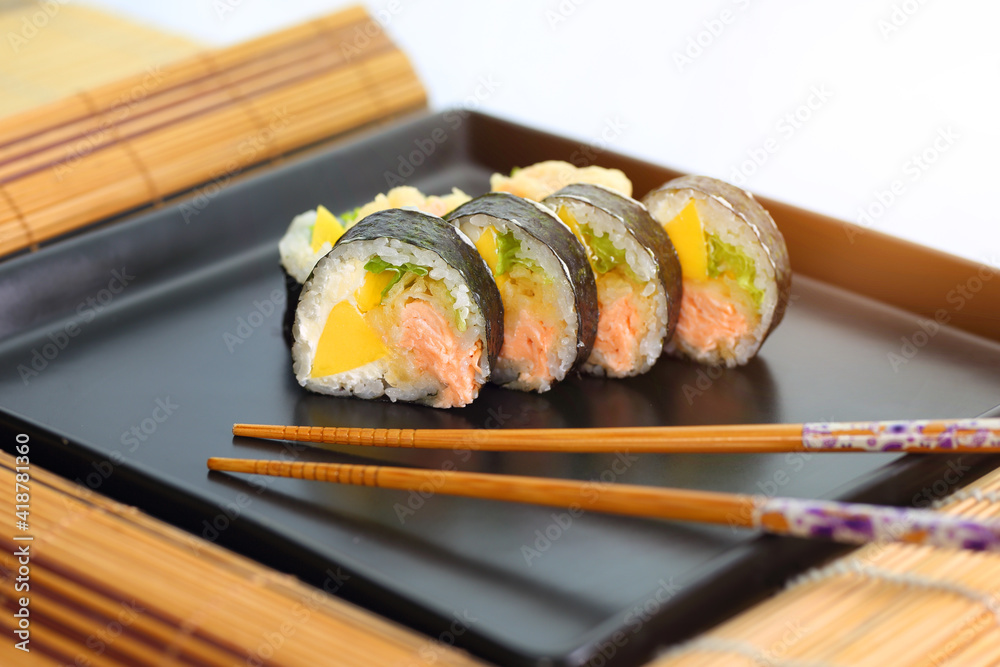 delicious sushi made from fresh and delicious and healthy fish prepared in a home way delicious sushi made from fresh and delicious and healthy fish prepared in a home way