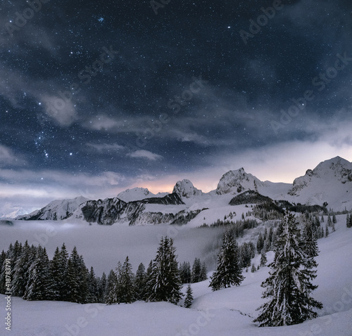 winter panorama landscape in the alps of switzerland after sunset