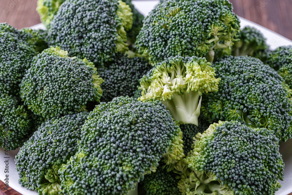 A lot of broccoli for diet and healthy eating. Fresh green broccoli on a table.Broccoli vegetable is full of vitamin.Vegetables for diet and healthy eating.Organic food. A lot of broccoli for diet and healthy eating. Fresh green broccoli on a table.Broccoli vegetable is full of vitamin.Vegetables for diet and healthy eating.Organic food.