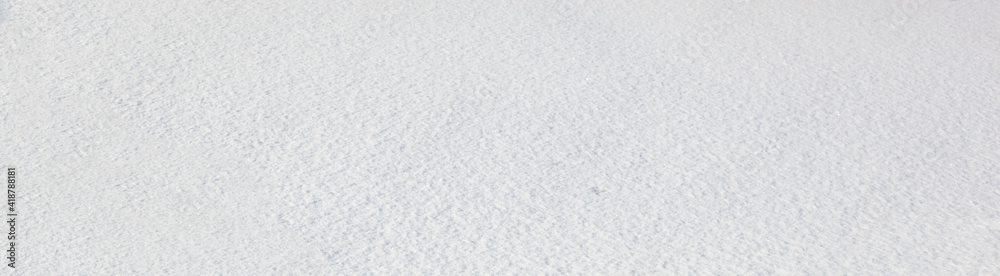 Winter snow in park. Top view of the snow surface Winter snow in park. Top view of the snow surface