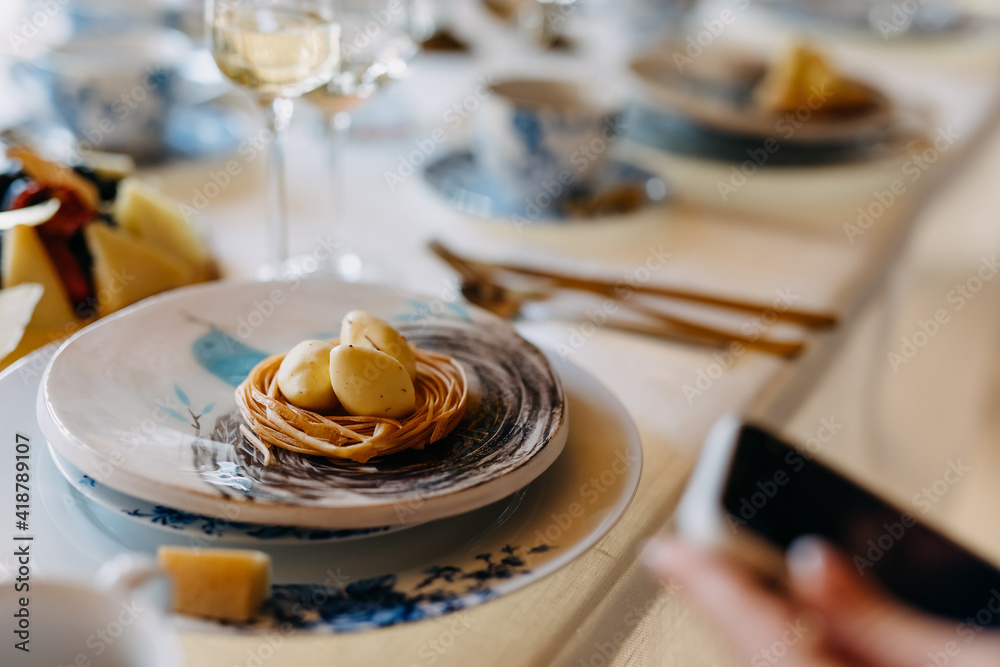 Table setting with vintage tableware and a dessert dish.