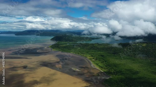 blue water golfe dulce brown water river zancudo Golfito bay aerial Costa Rica photo
