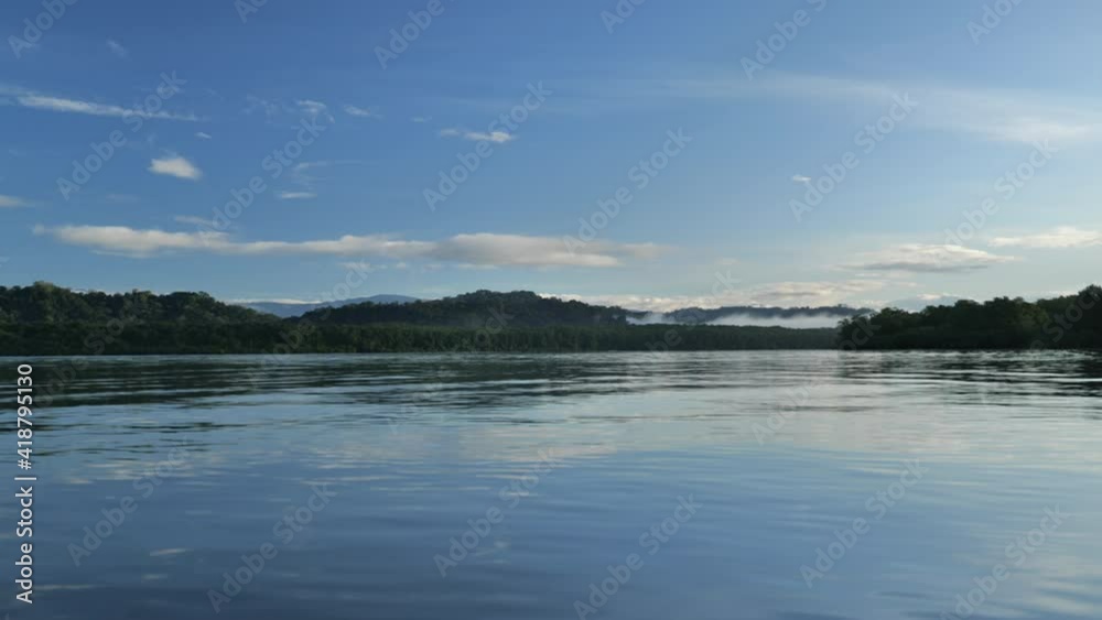 Glassy calm water Golfe Dulce Costa Rica early morning Glassy calm water Golfe Dulce Costa Rica early morning