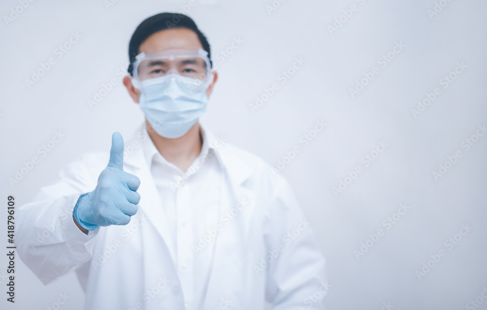 Asian Doctor Showing thumbs up for best health and insurance package plan for advertising, over isolated white background, medicine, healthcare and pandemic concept Asian Doctor Showing thumbs up for best health and insurance package plan for advertising, over isolated white background, medicine, healthcare and pandemic concept