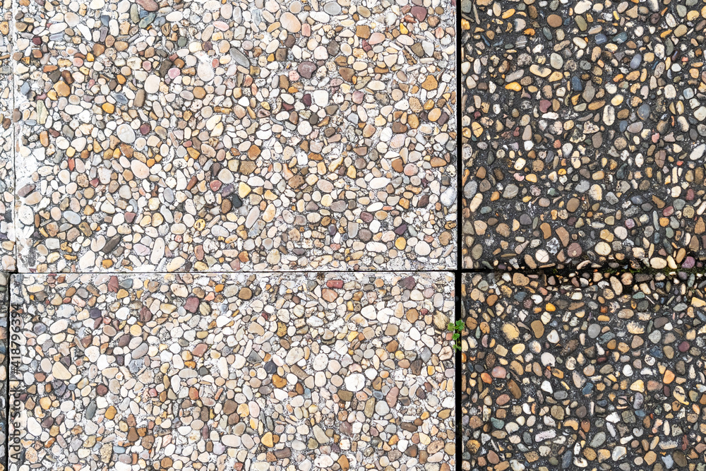 Fototapeta premium Pebble stone in outdoor tiles with geometric shapes
