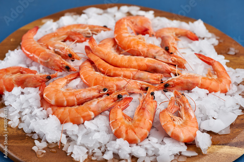 Raw red shrimps on ice