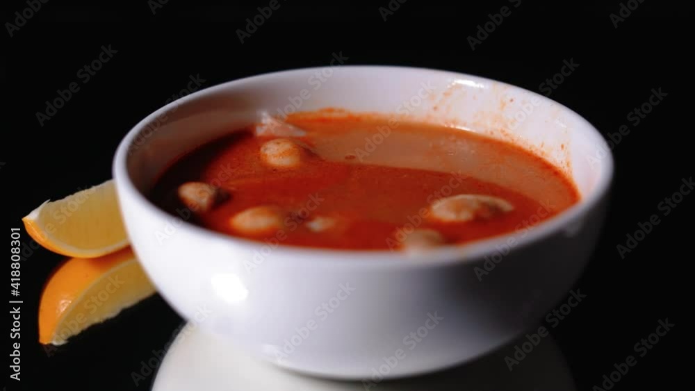 Tasty Tom Yum soup with shrimps and coconut milk. Tasty Tom Yum soup with shrimps and coconut milk.