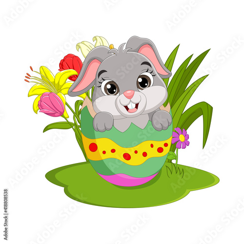 Cartoon easter bunny inside a cracked easter egg