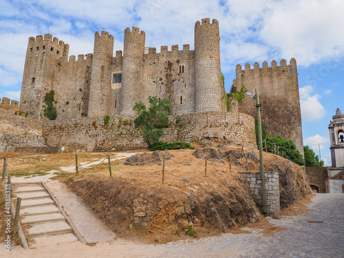Beautiful stone masonry Castle of Obidos or famous Castelo de Óbidos is a well-preserved medieval castle located in the civil parish of Santa Maria, São Pedro e Sobral da Lagoa, Oeste, Portugal. photo