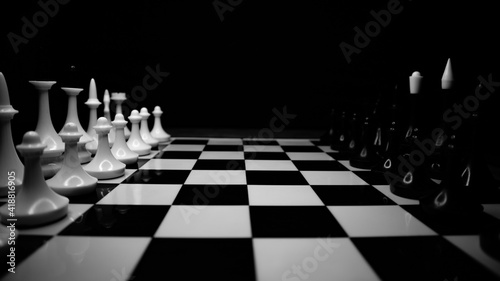 black and white chess on chessboard black and white photo