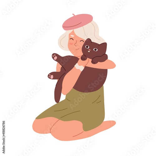 Scene with little kid hugging cat. Happy child sitting and holding with adora...