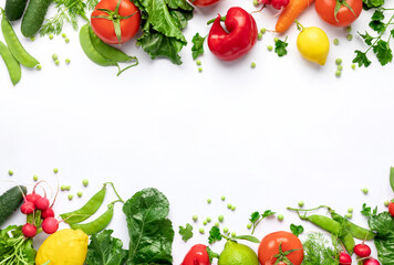 Healthy food vegetarian food background. Frame of fresh vegetables and fruits on white background top view