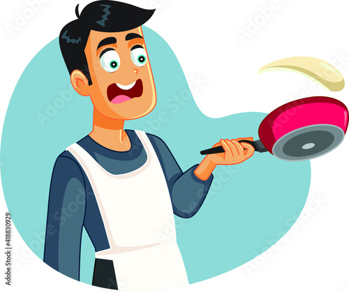 Male Home Cook Failing to Flip Pancakes