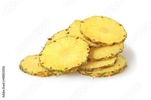 Several slices of tasty pineapple isolated on white