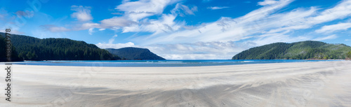 Beautiful panoramic view of sandy beach on Pacific Ocean Coast. Cloudy Blue Sky Art Render. Taken in San Josef Bay, Cape Scott Provincial Park, Northern Vancouver Island, BC, Canada. © edb3_16